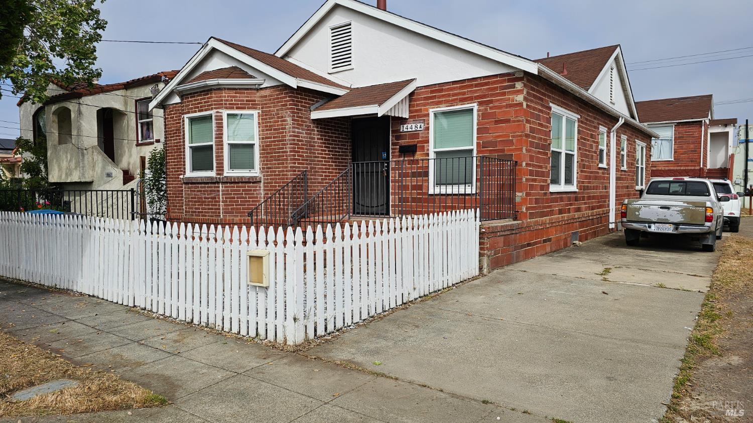 1448 Rice Street, Unit A Vallejo, CA 94590 - Photo 8 of 8 a front view of a house with a yard