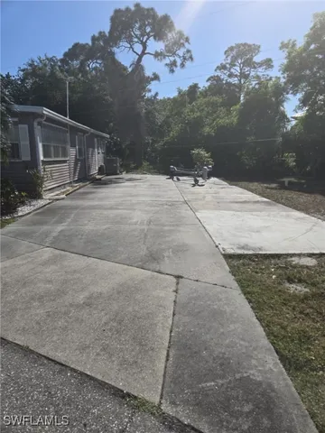 a view of swimming pool with a yard