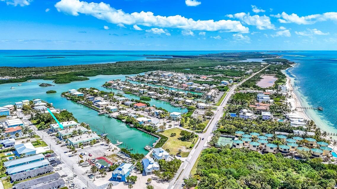 109 Ave D, Unit 305 Marathon, FL 33050 - Photo 14 of 41 a view of a city with an ocean
