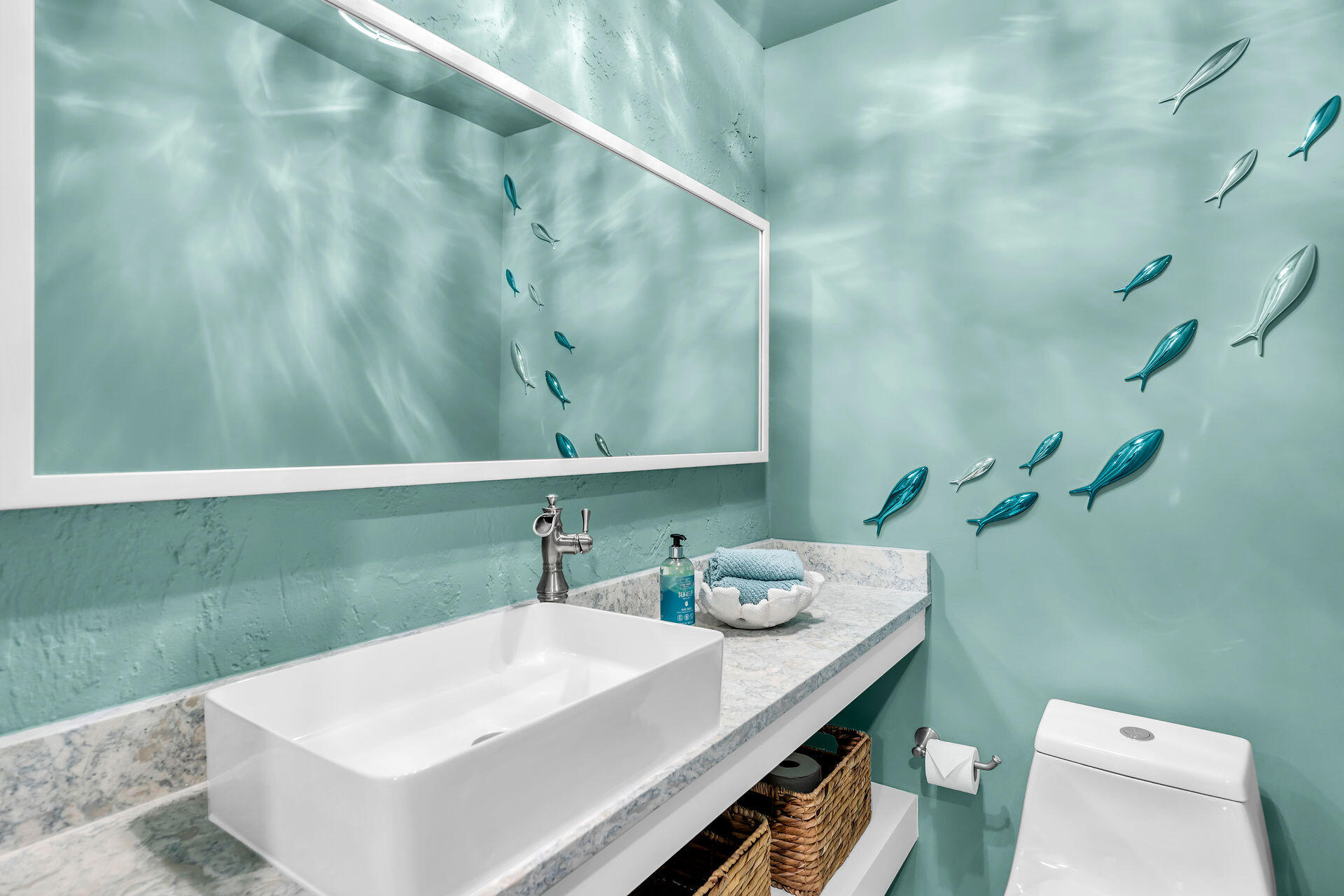 109 Ave D, Unit 305 Marathon, FL 33050 - Photo 30 of 41 a bathroom with a sink and a mirror