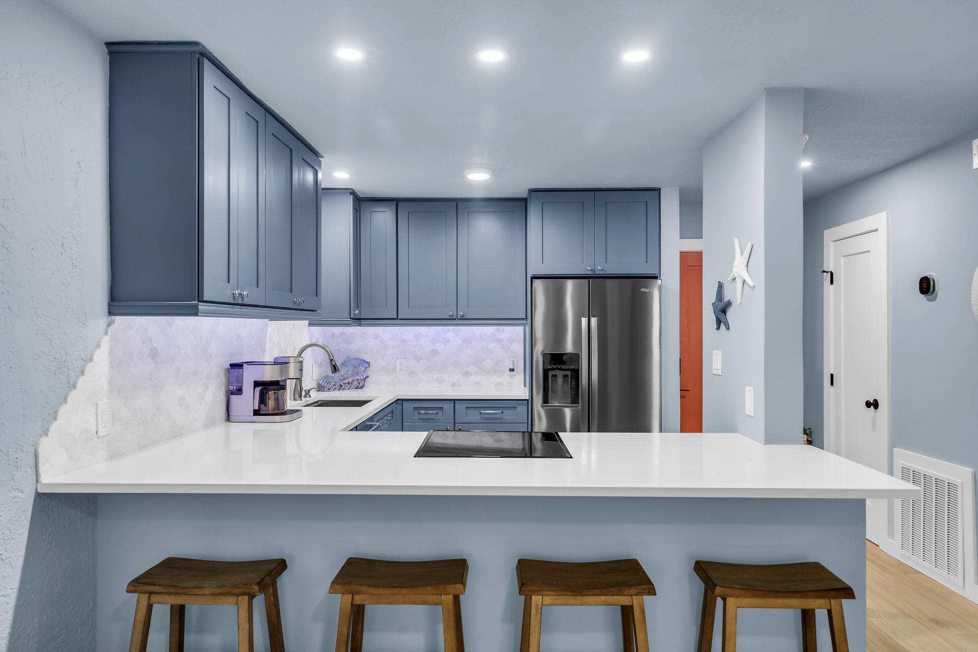 109 Ave D, Unit 305 Marathon, FL 33050 - Photo 8 of 41 a kitchen with cabinets and stainless steel appliances