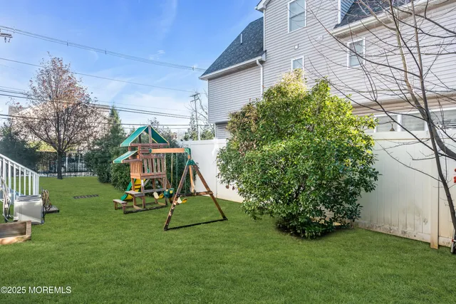 a view of a park with a slide