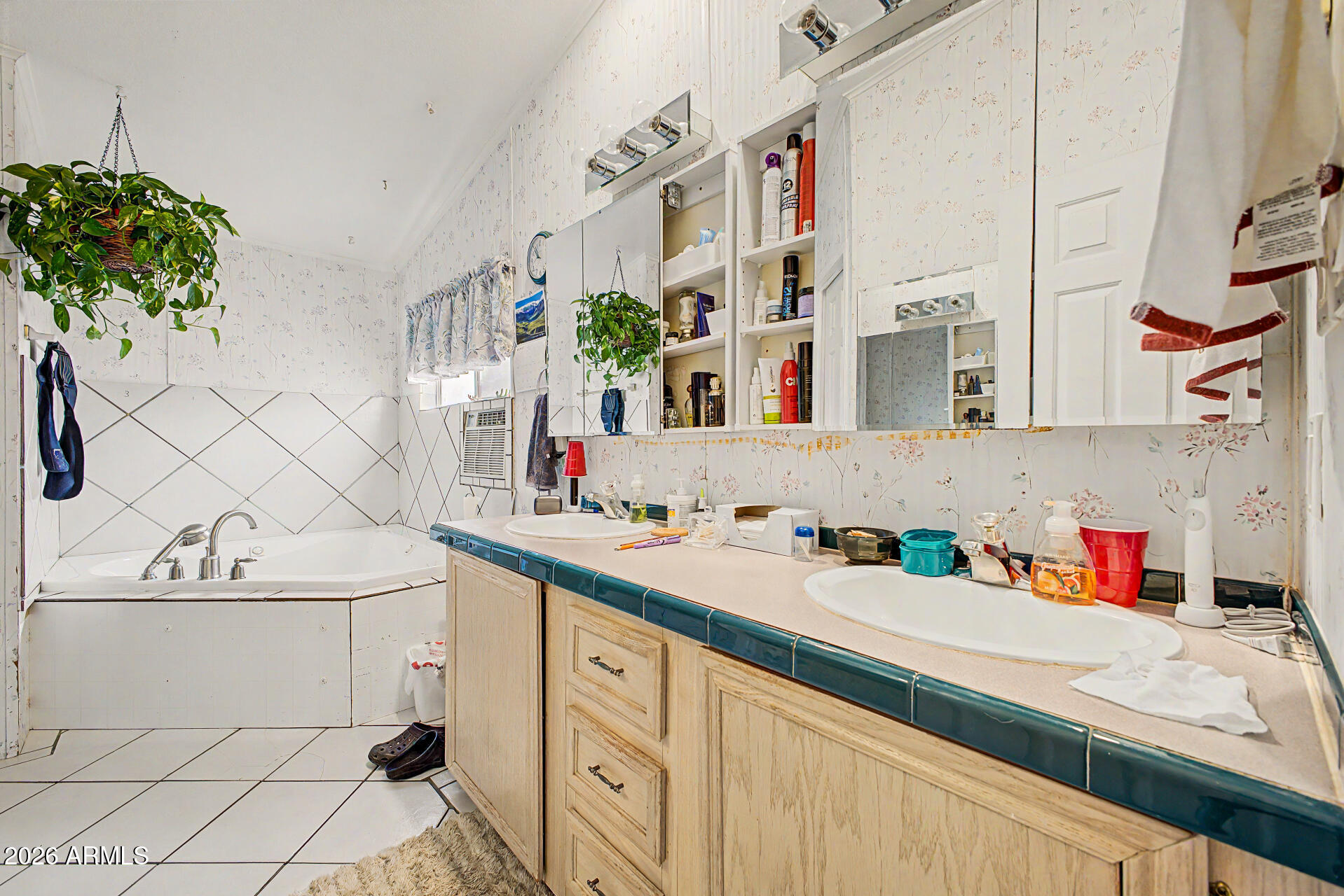 2548 South Val Vista Road Apache Junction, AZ 85119 - Photo 25 of 29 a bathroom with a sink and a mirror
