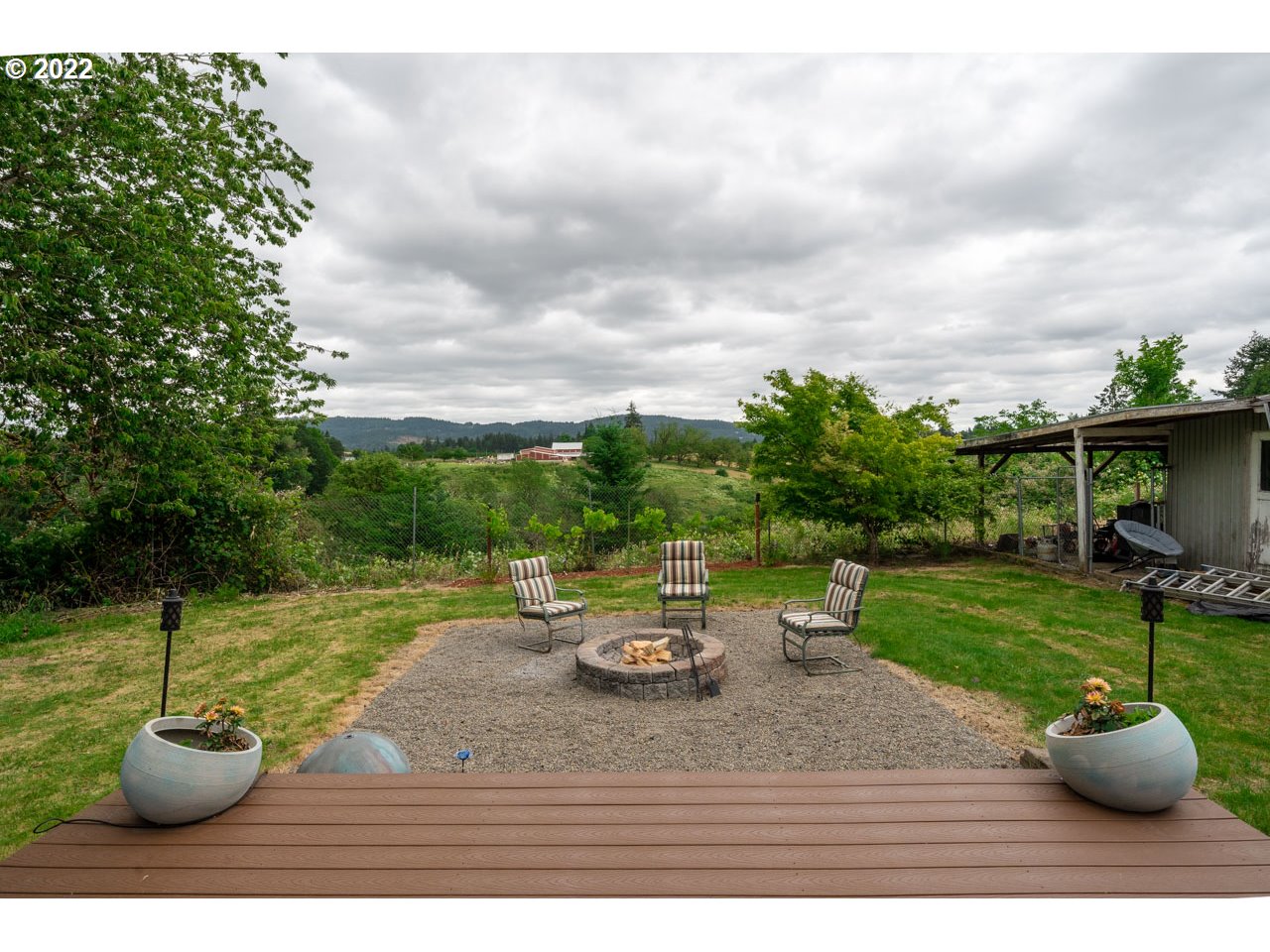 8480 Northeast Dog Ridge Road Newberg, OR 97132 - Photo 26 of 30 a view of a yard with patio