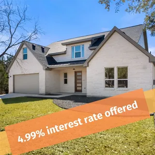 a view of a house with a big yard