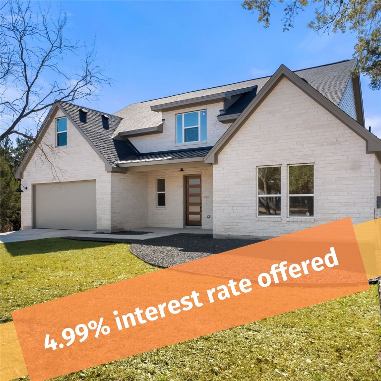 300 Bedford Drive Spicewood, TX 78669 - Photo 1 of 37 a view of a house with a big yard