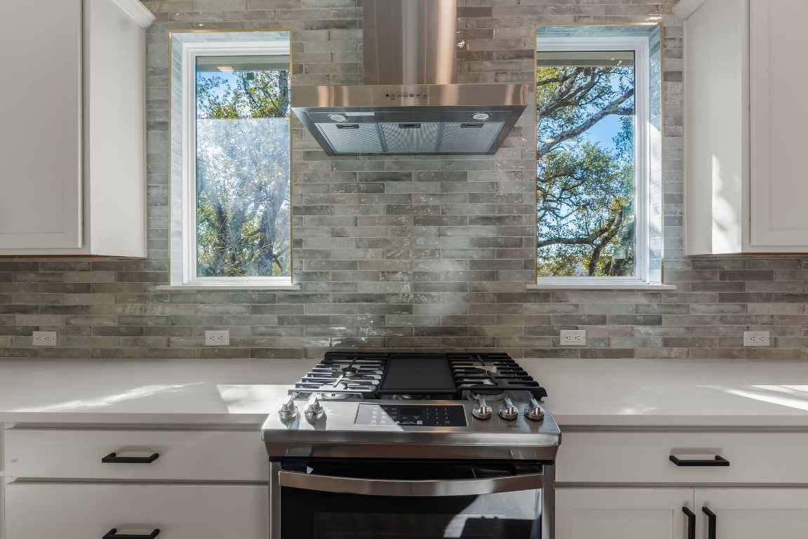 300 Bedford Drive Spicewood, TX 78669 - Photo 5 of 37 a sink sitting inside of a kitchen