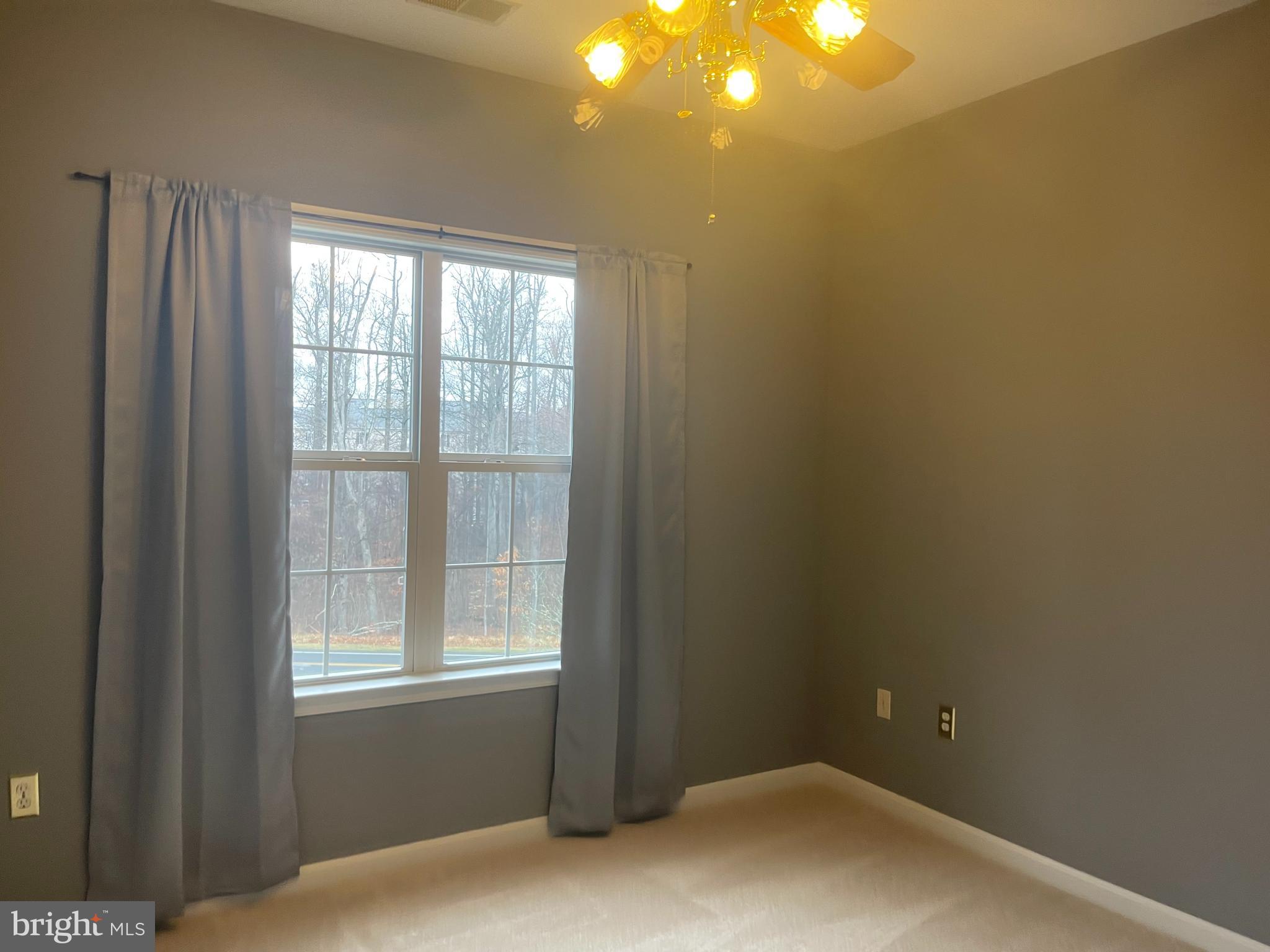 402 Aggies Circle, Unit L Bel Air, MD 21014 - Photo 15 of 23 a view of an empty room with a window