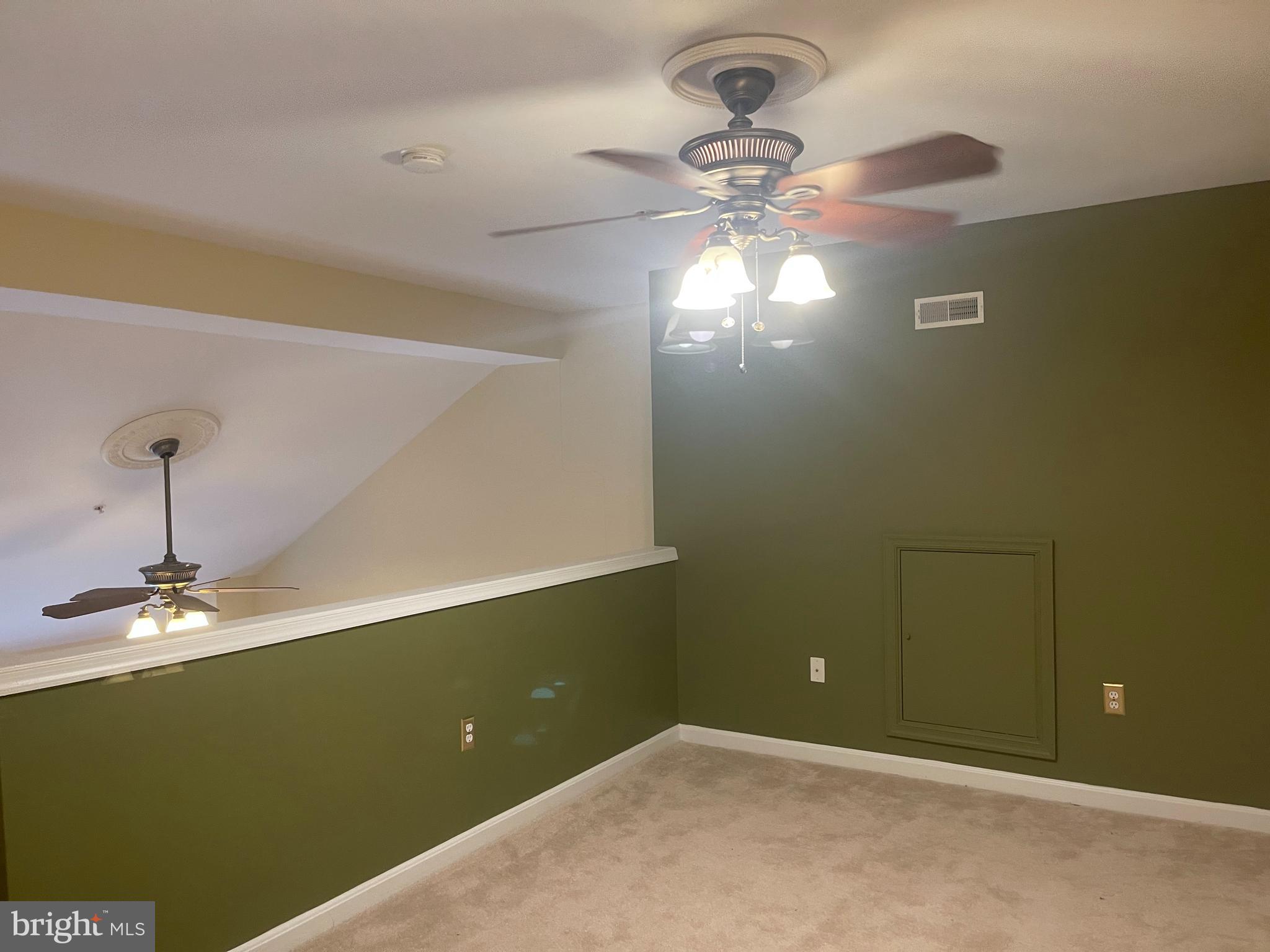 402 Aggies Circle, Unit L Bel Air, MD 21014 - Photo 9 of 23 a view of a chandelier fan in a room