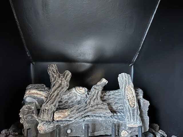 7402 Rockingham Road Mentor, OH 44060 - Photo 31 of 32 Fireplace with Gas logs