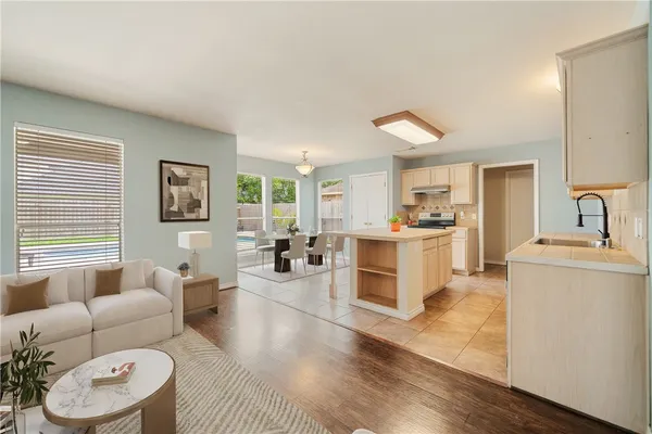 a living room with furniture and a couch