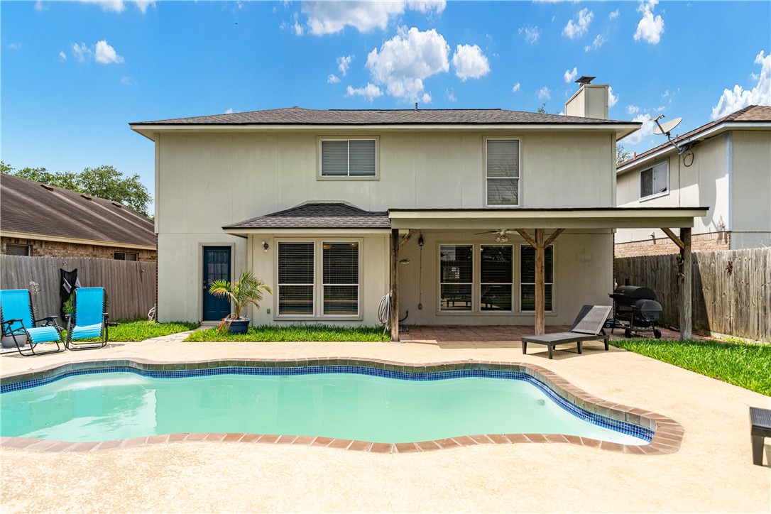 7630 Cedar Brook Drive Corpus Christi, TX 78413 - Photo 29 of 32 a view of a house with swimming pool and sitting area
