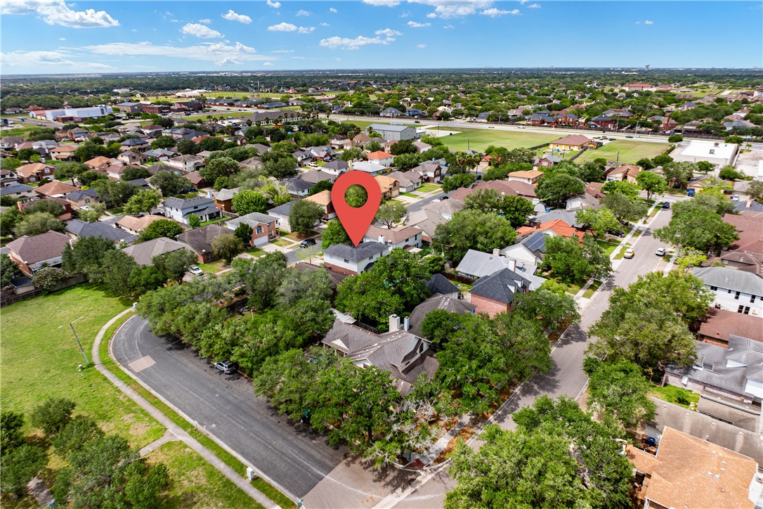 7630 Cedar Brook Drive Corpus Christi, TX 78413 - Photo 31 of 32 an aerial view of residential houses with outdoor space and trees