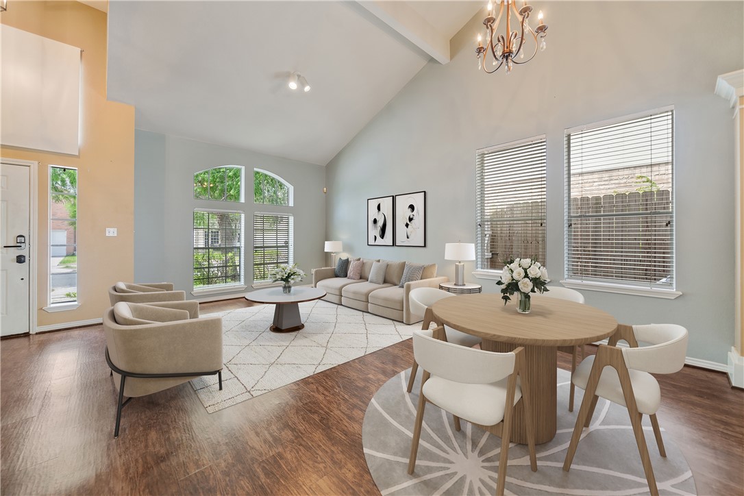 7630 Cedar Brook Drive Corpus Christi, TX 78413 - Photo 6 of 32 a living room with fireplace furniture and a large window