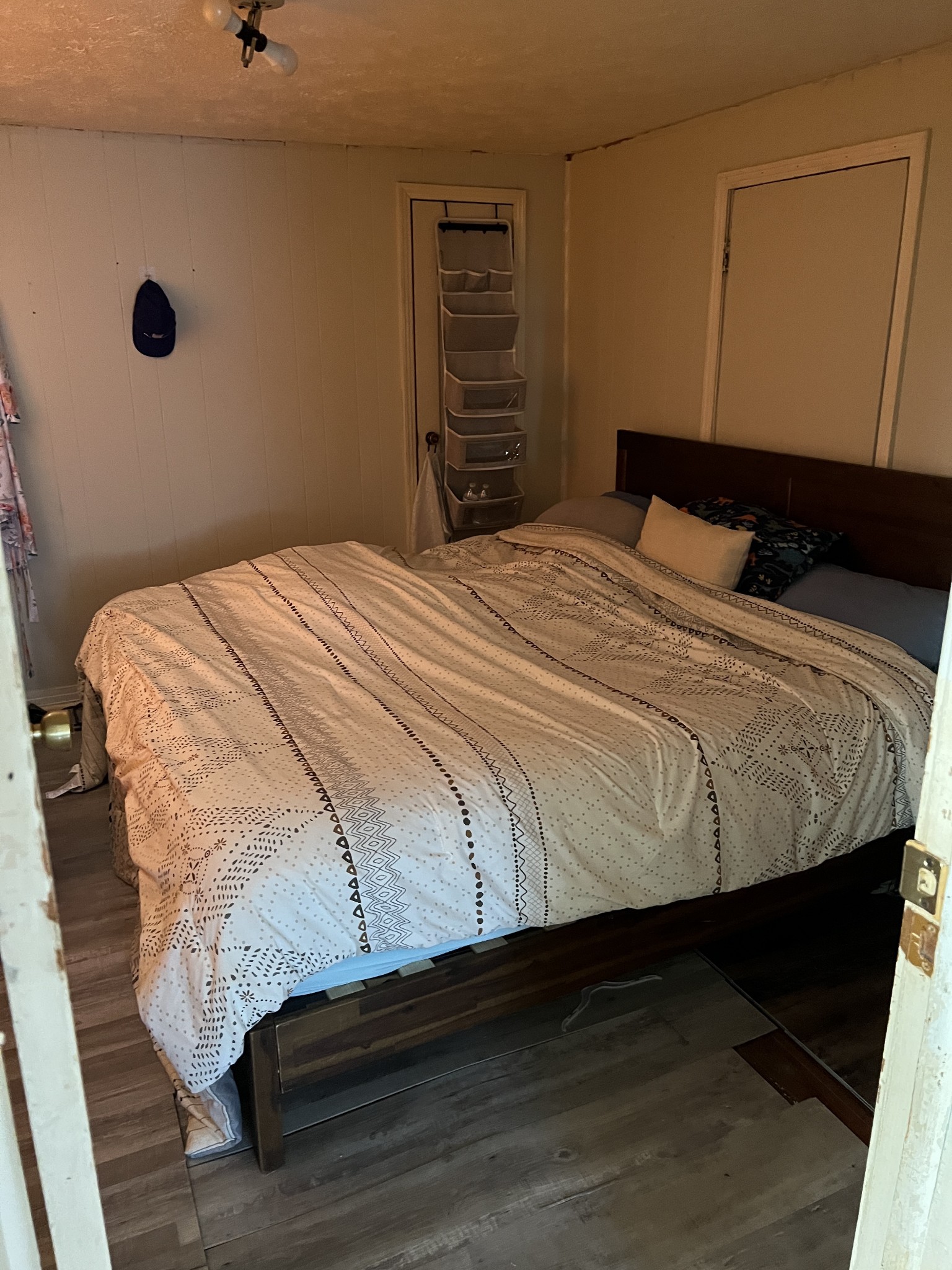 400 Hurricane Loop Tennessee Ridge, TN 37178 - Photo 6 of 7 a bedroom with a bed and a night stand