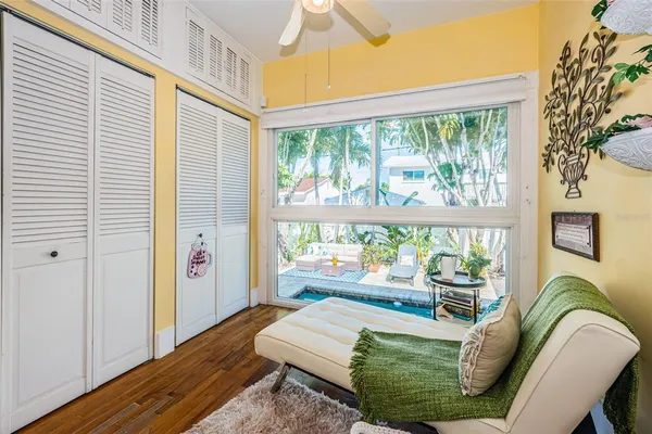 a living room with furniture and a window