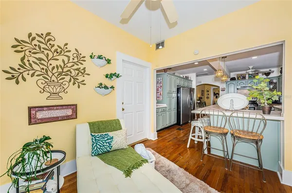 a living room with furniture and a table