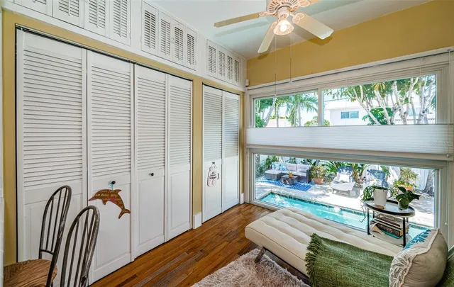 a room with furniture and a large window