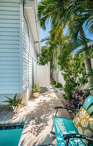 a house with a window and yard in back