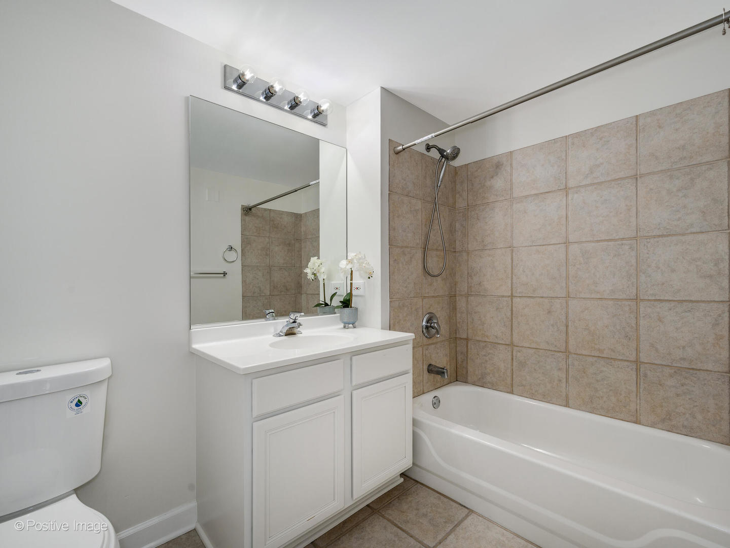 5 East 14th Place, Unit 1506 Chicago, IL 60605 - Photo 16 of 23 a bathroom with a sink toilet vanity and bathtub