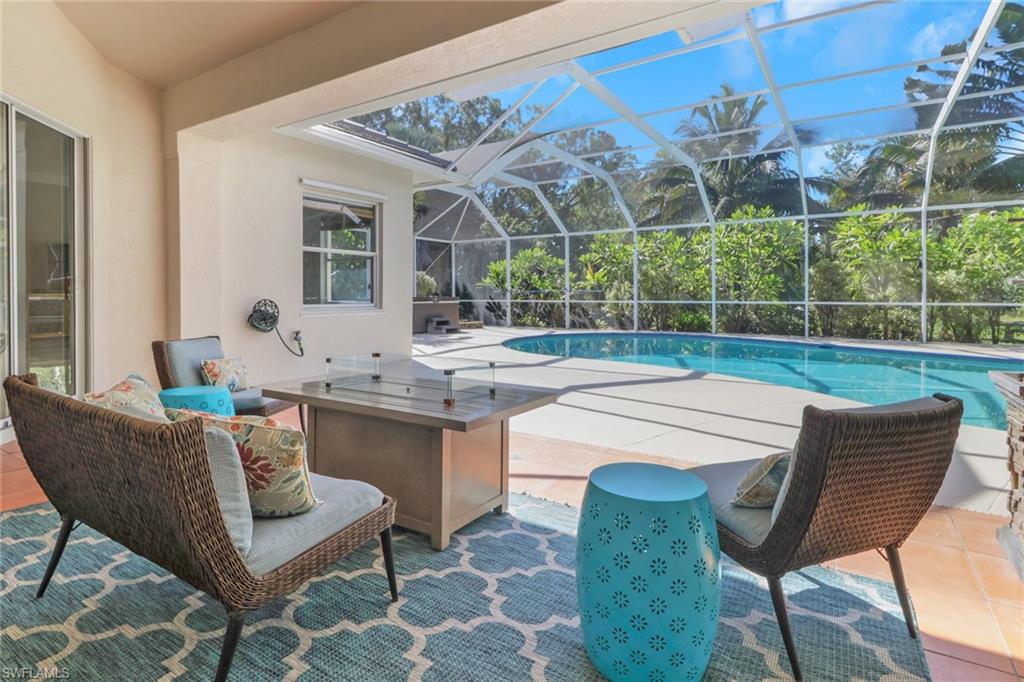 4380 7th Avenue Southwest Naples, FL 34119 - Photo 26 of 39 a dining room with furniture and window
