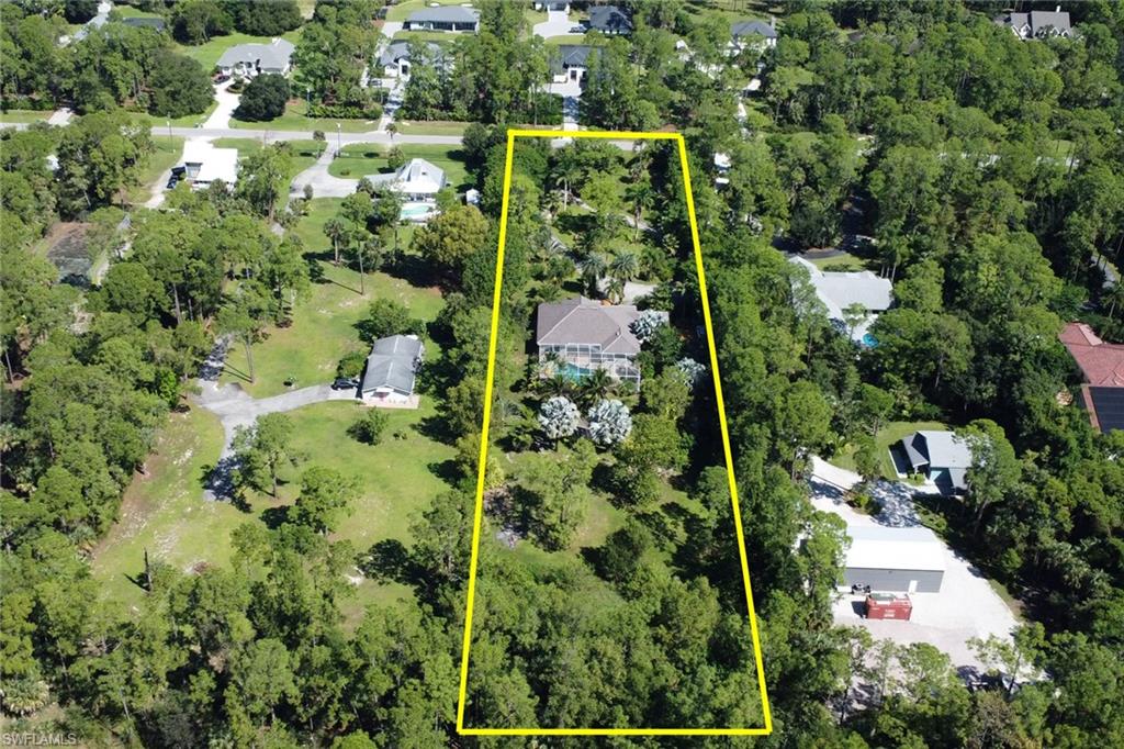 4380 7th Avenue Southwest Naples, FL 34119 - Photo 36 of 39 a view of a garden