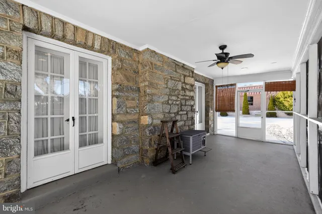 a view of livingroom with furniture and windows