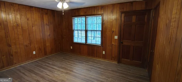 wooden floor and windows in an empty room