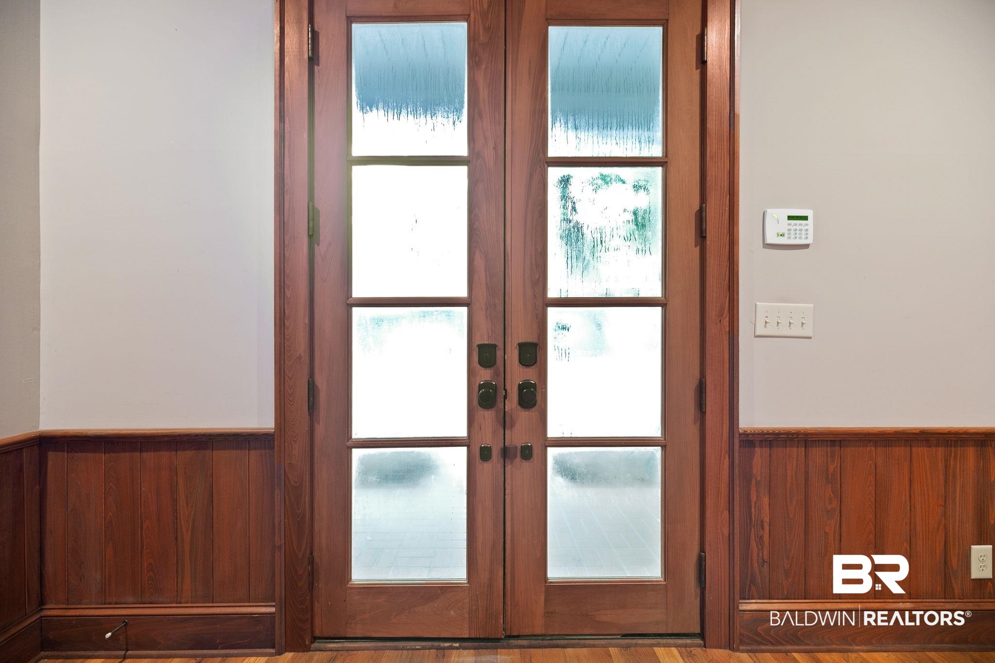 202 Beall Lane Daphne, AL 36526 - Photo 6 of 46 Entryway with plenty of natural light, french doors, and hardwood / wood-style floors