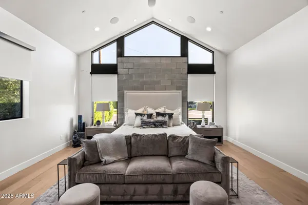 a living room with furniture fireplace and a flat screen tv