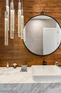 a bedroom with a large bed and a large window