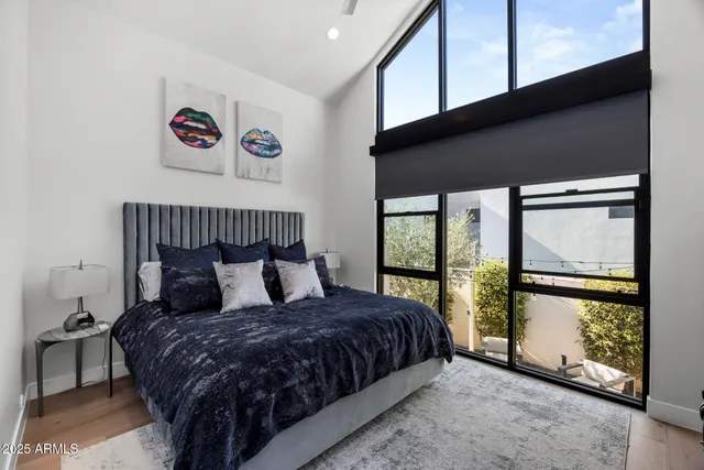 a work room with furniture and a flat screen tv