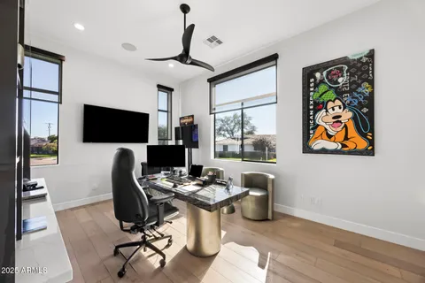a view of a bathroom with tub shower and window