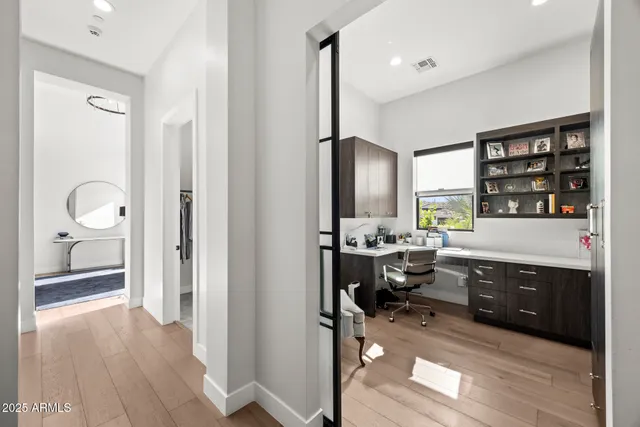a utility room with sink dryer and washer