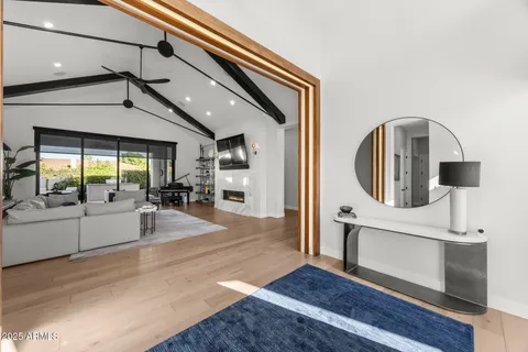 a view of a living room and entry way