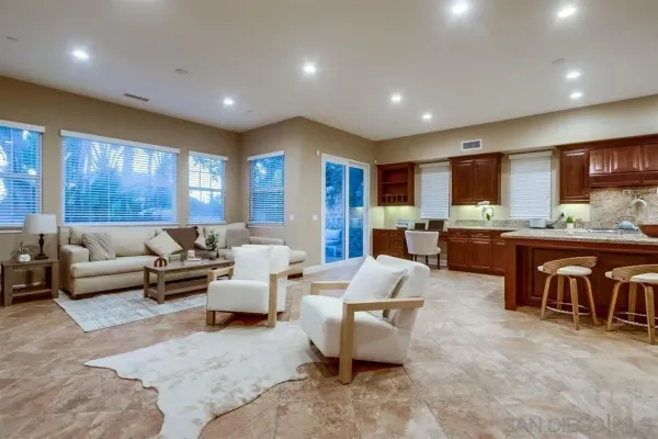 a kitchen with a sink and a refrigerator