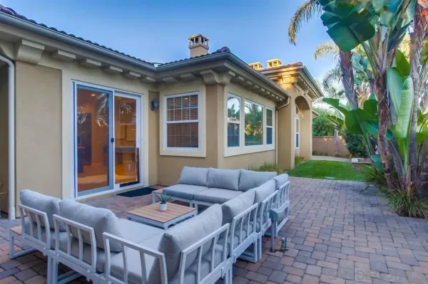 a outdoor living space with furniture and a potted plant
