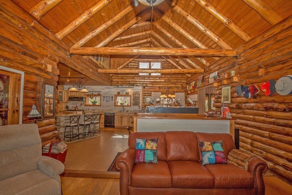 302 Fox Den Road Tolland, MA 01034 - Photo 15 of 41 a roof deck with couch and chairs