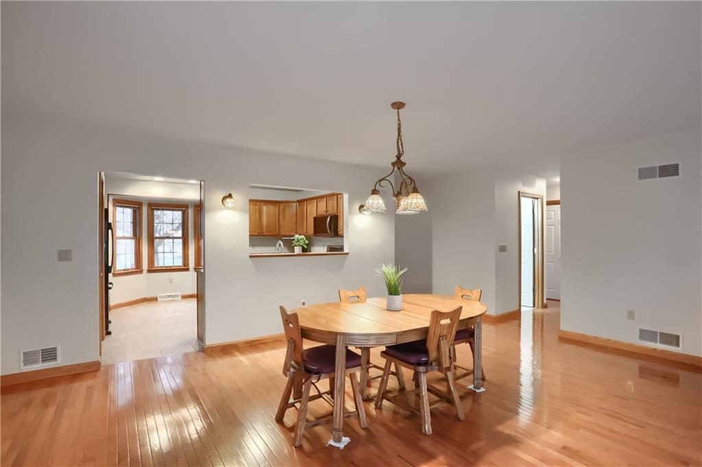 119 South Butler Street Saxonburg, PA 16056 - Photo 12 of 39 a view of a dining room with furniture and wooden floor