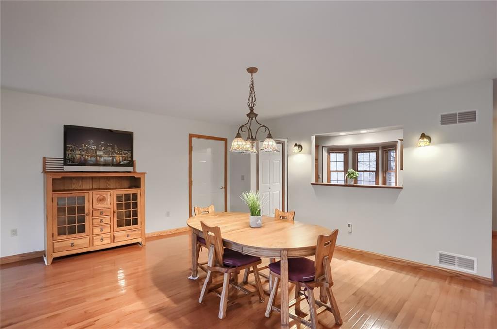 119 South Butler Street Saxonburg, PA 16056 - Photo 13 of 39 a view of a dining room with furniture window and wooden floor
