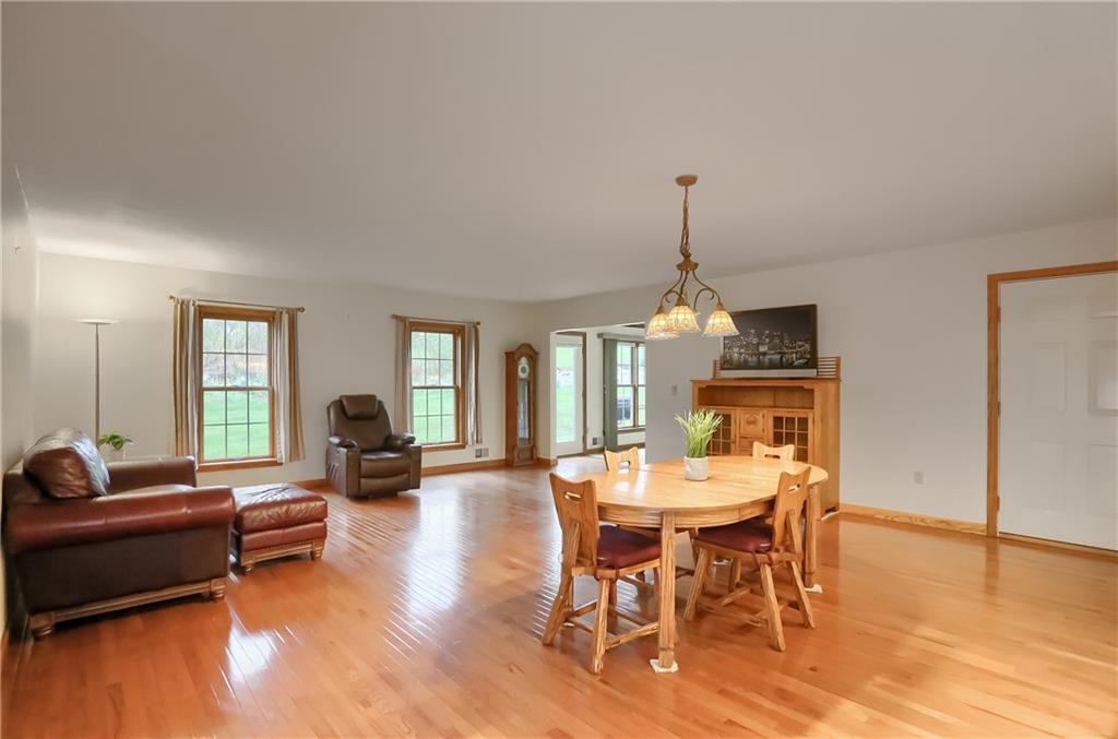 119 South Butler Street Saxonburg, PA 16056 - Photo 15 of 39 a view of a dining room with furniture window and wooden floor