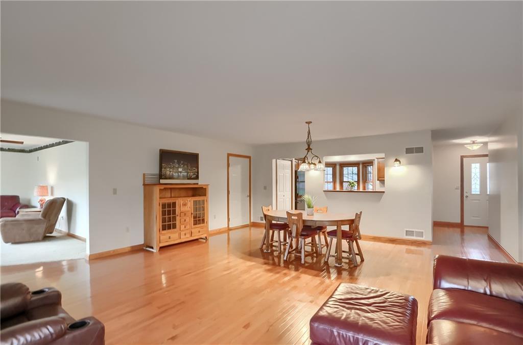 119 South Butler Street Saxonburg, PA 16056 - Photo 16 of 39 a living room with furniture and a wooden floor