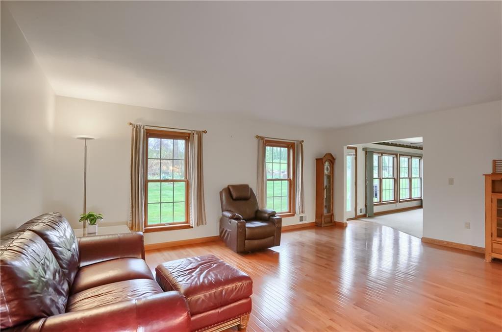 119 South Butler Street Saxonburg, PA 16056 - Photo 19 of 39 a living room with furniture and a window