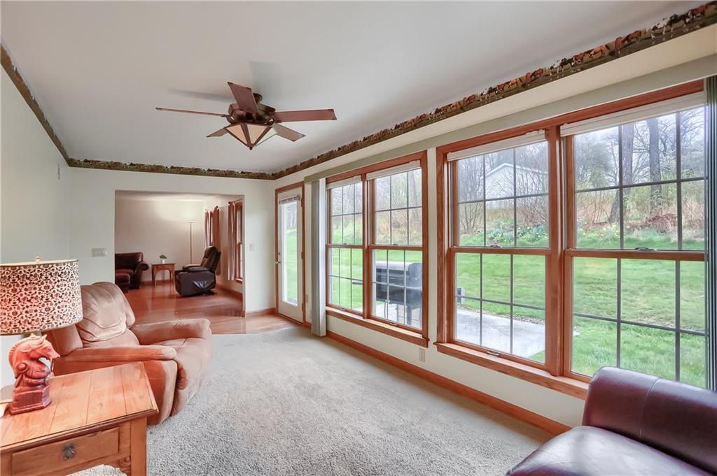 119 South Butler Street Saxonburg, PA 16056 - Photo 20 of 39 a living room with furniture and a large window