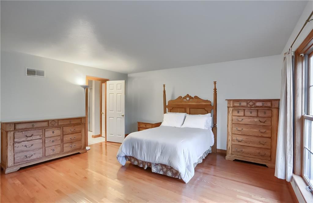 119 South Butler Street Saxonburg, PA 16056 - Photo 24 of 39 a bedroom with a bed dresser and a window