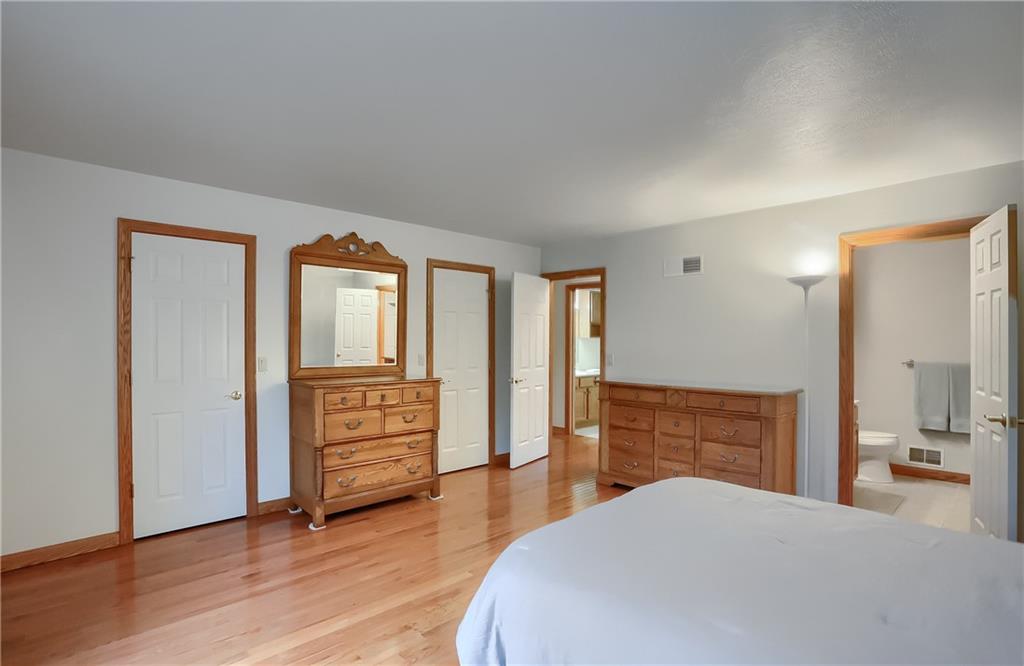 119 South Butler Street Saxonburg, PA 16056 - Photo 25 of 39 a bedroom with a bed and a dresser