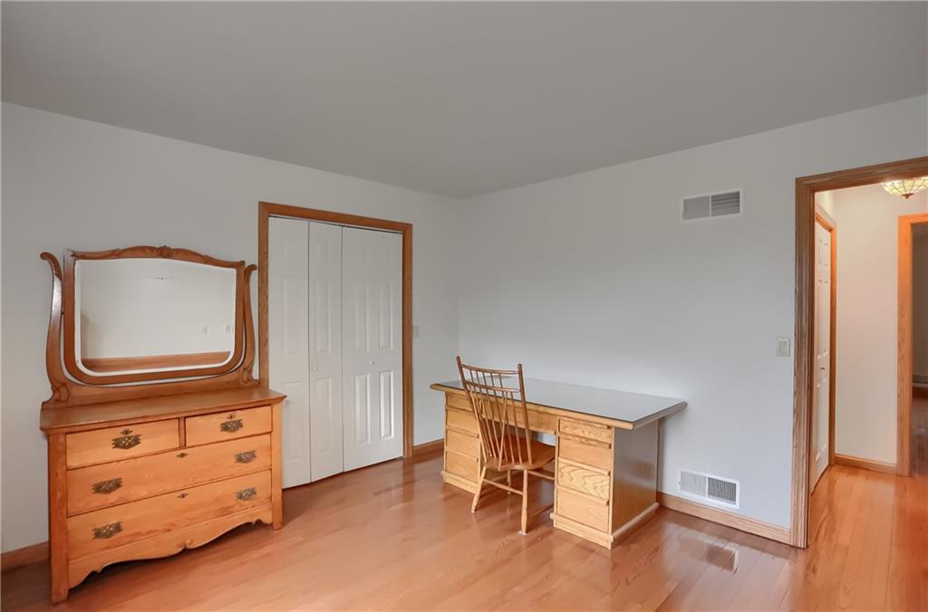 119 South Butler Street Saxonburg, PA 16056 - Photo 28 of 39 a room with chair and dresser