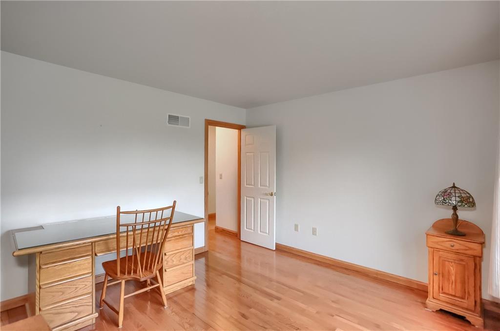119 South Butler Street Saxonburg, PA 16056 - Photo 29 of 39 a view of a livingroom with furniture and wooden floor