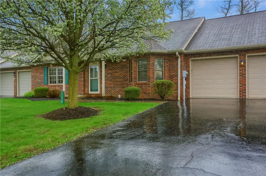 119 South Butler Street Saxonburg, PA 16056 - Photo 3 of 39 a front view of a house with garden