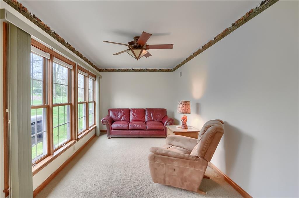 119 South Butler Street Saxonburg, PA 16056 - Photo 31 of 39 a living room with furniture and a large window